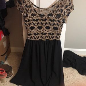 Black and gold dress